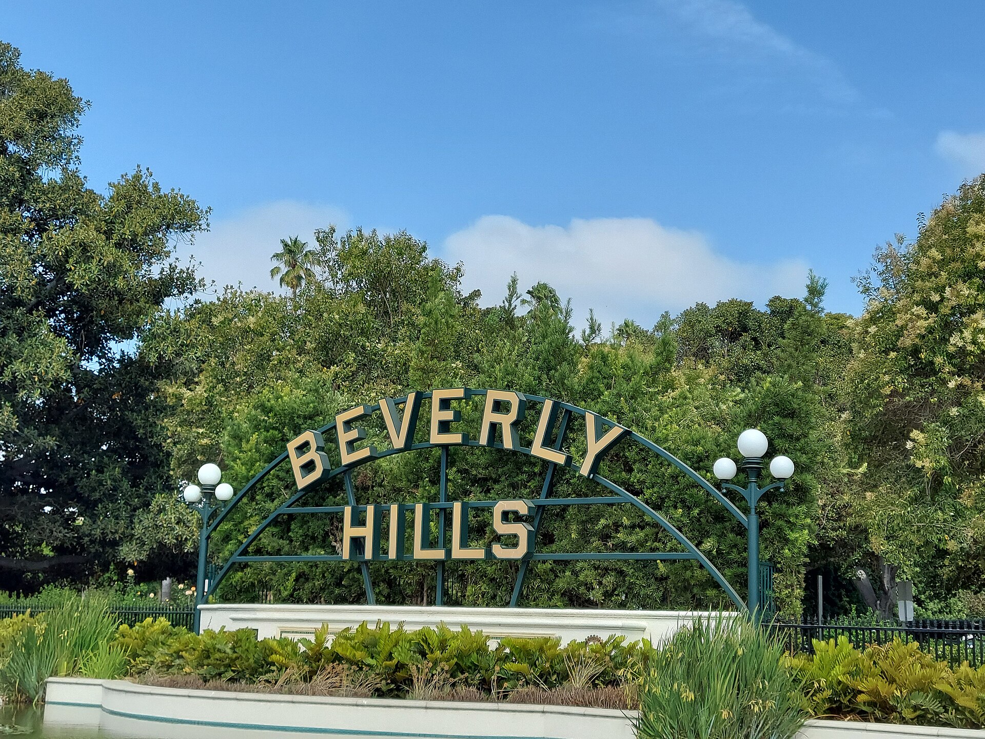 The "Beverly Hills" sign and lily pond at Beverly Gardens Park