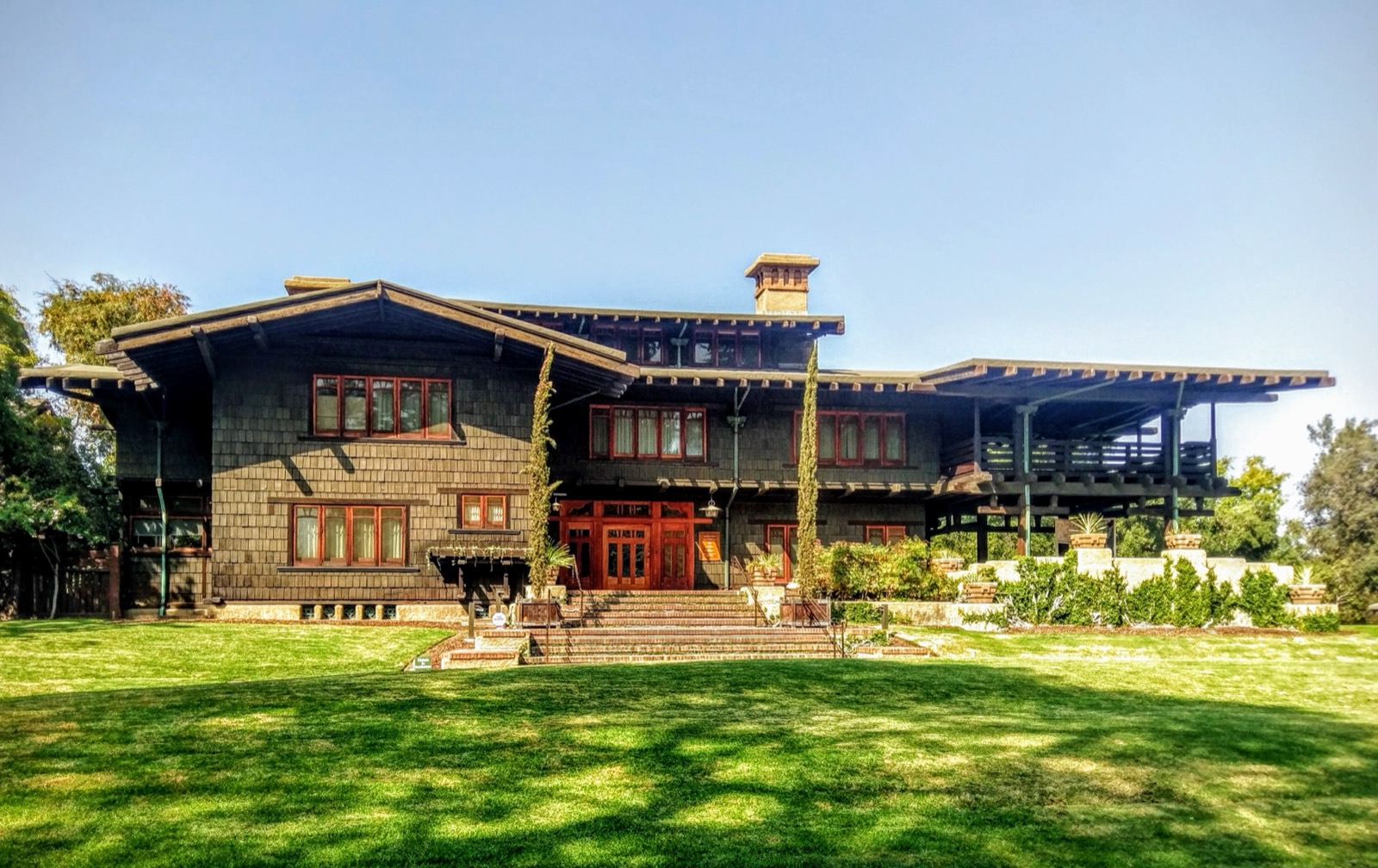 Front exterior of the Gamble House, Greene and Greene's landmark 1908 American Craftsman home in Pasadena